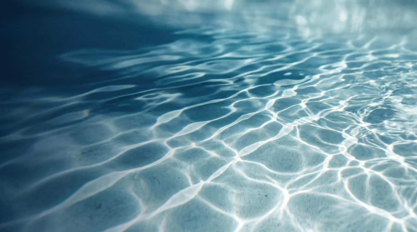 Light ripples on the bottom of a pool
