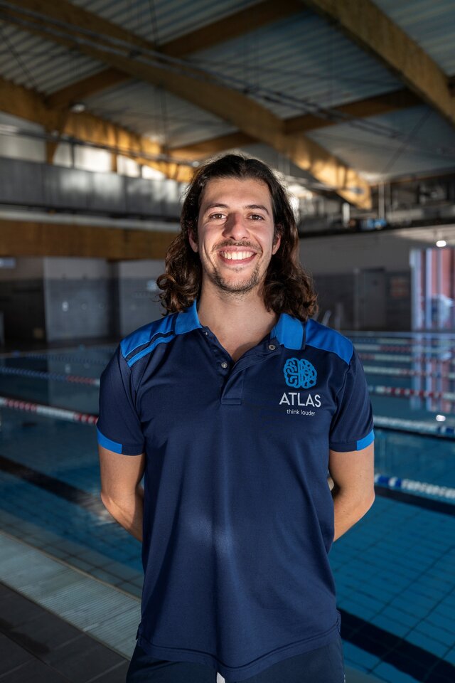Simone Novati, CEO of SwimSensei, poolside